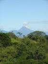 View of Arenal Volcano from San Carlos over tropical hardwood jungle
